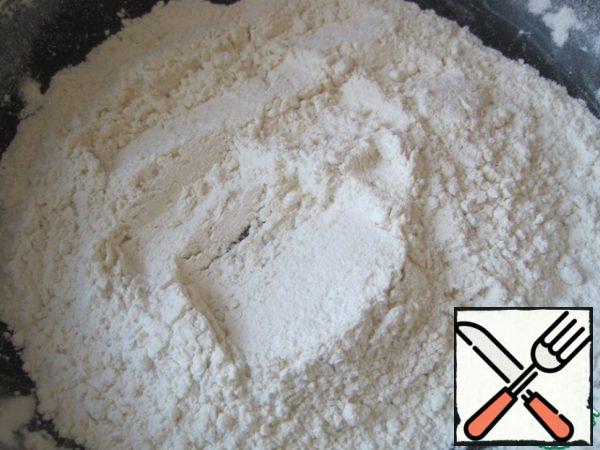 Fry the flour in a dry frying pan until a pleasant nutty smell appears, sift.
