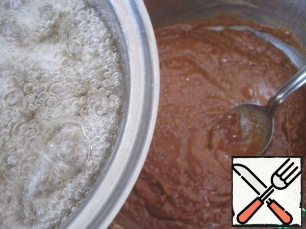 Pour half of the hot syrup on the peanuts, half on the seeds.
