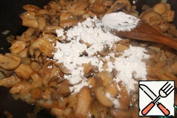 Fry onions and mushrooms in the same oil, add flour, mix well.
