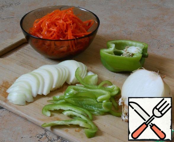 Onions and bell peppers cut into strips.