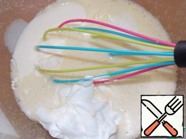 Add the melted butter and sour cream, mix.
