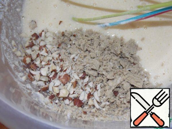 Add the ground halva and chopped hazelnuts.