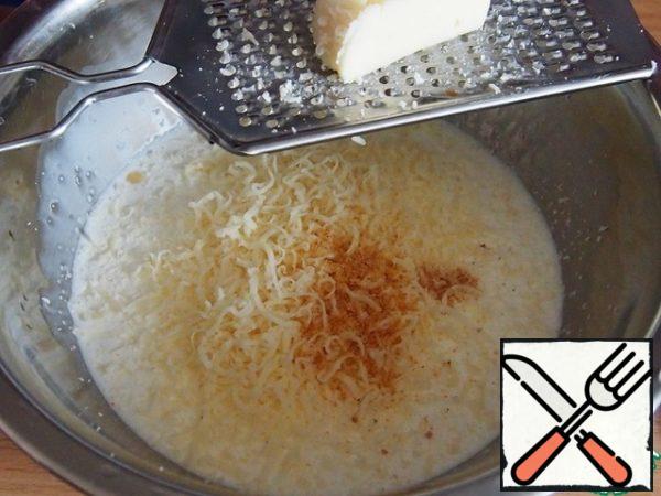 Cream mix with cheese, grated on a fine grater, add nutmeg.