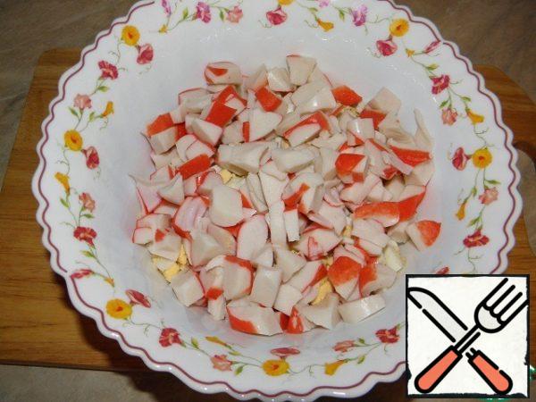 Crab sticks (I have crab sticks. meat) cut into cubes.
