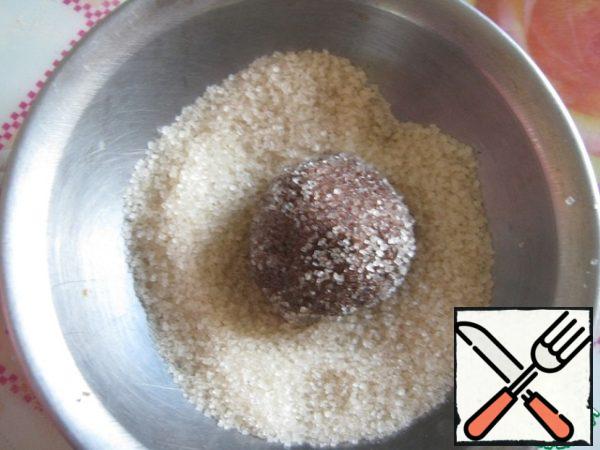 The resulting ball is rolled in brown sugar.