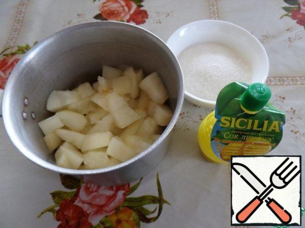 Pieces of melon spread in a small pot. Add sugar. Put the pan on the fire.