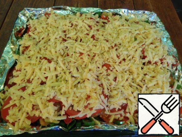 Grate the cheese on a coarse grater and put it on top of the tomatoes - you will get a golden crust.
