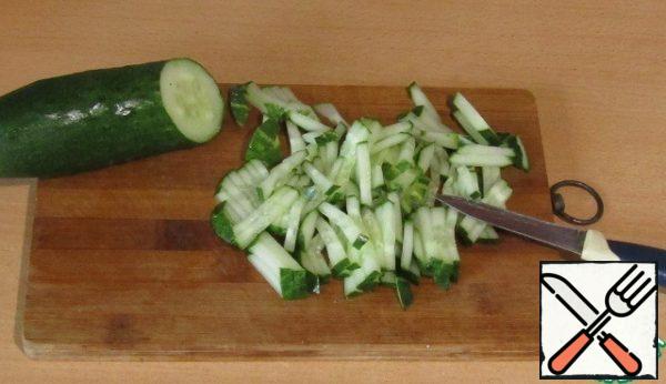 Cucumber wash and cut into strips.