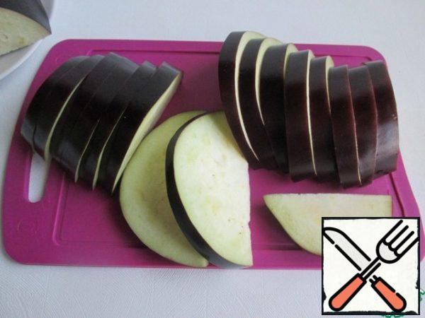 Cut the eggplant into slices.
