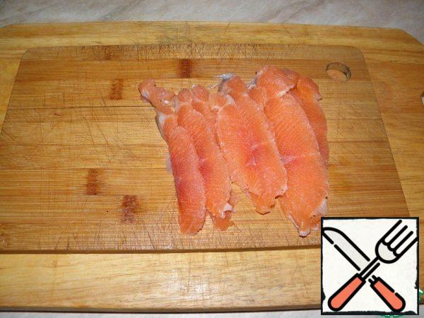 Fish cut into long strips.