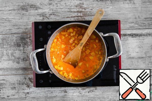 Add the potatoes and fry for another 5 minutes. Sprinkle with paprika, stir and pour in the milk. Bring to a boil and simmer until the potatoes are tender, about 15 minutes. Whisk with an immersion blender until smooth.

