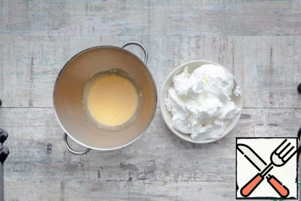 Separate the whites from the yolks. Whisk the yolks with 2-3 tablespoons of olive oil. Separately, whisk the whites into a steep foam.