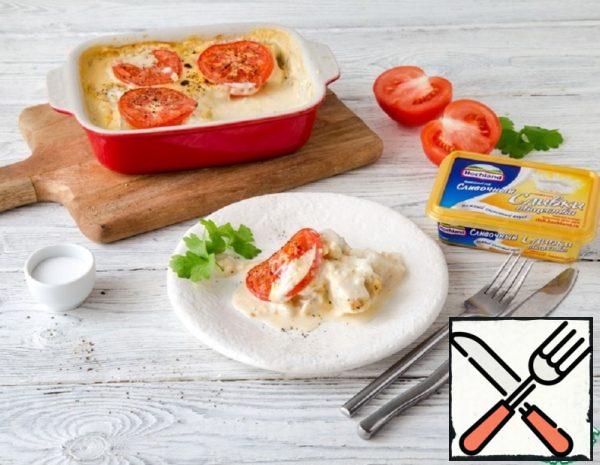 Fish baked with Tomatoes in Cheese Sauce Recipe