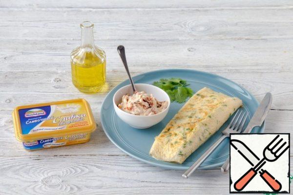 Turn the omelet over onto a heated plate and serve immediately.