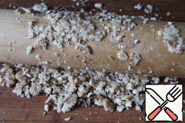 Nuts crush with a rolling pin, garlic skip through the press.