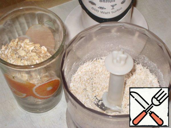 Grind oatmeal in a blender.
Sift regular flour with baking powder and baking soda and mix with oatmeal.