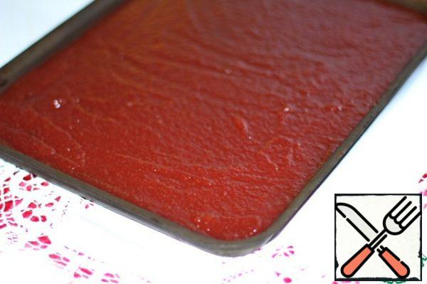 You can flatten it on a greased baking sheet or pour it into molds. You can also use silicone.
