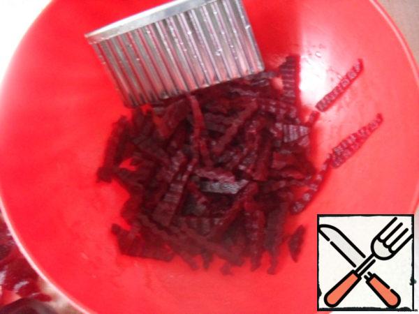 Beets cut into thin cubes, add a little oil (to less stained other ingredients).