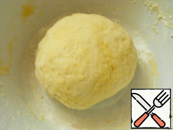 Dissolve sugar and salt in water.
Add flour mixed with baking powder, add butter and knead the dough.