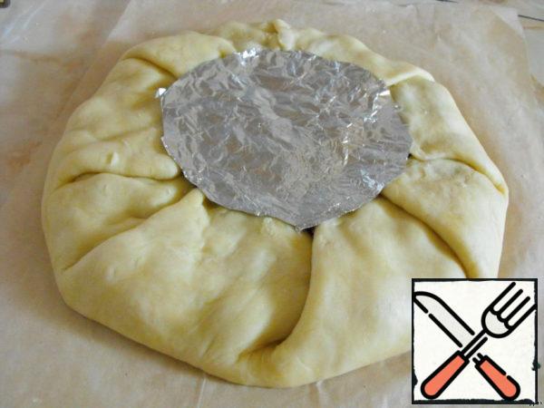 To cover an open middle with a circle of foil and bake the biscuits at 180C for 30-40 minutes.