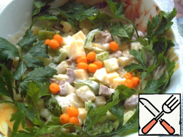 It is filled with mayonnaise. Garnish with parsley and sea buckthorn!
