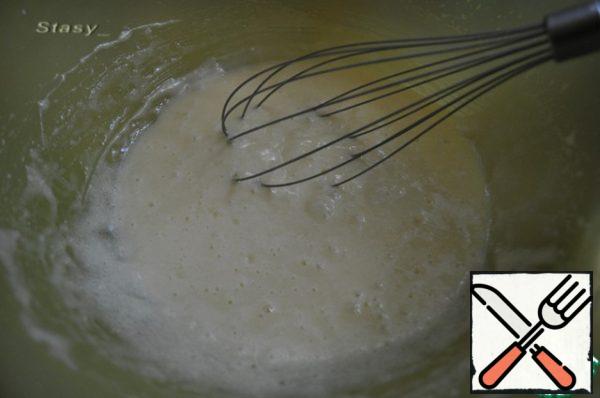 Softened margarine whisk with sugar and vanilla, add the eggs and whisk again.