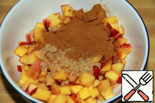 Peach cut into small cubes, add sugar and cinnamon and mix well.