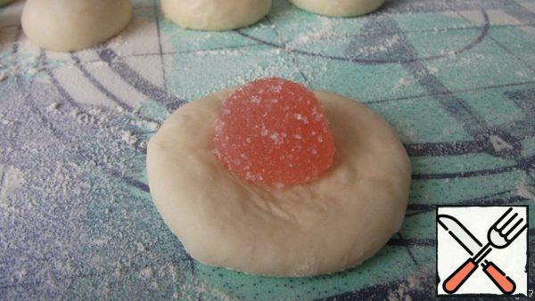Let stand for 10 minutes and start making buns. Making our gingerbread man in a flapjack in the center put a jelly bean.