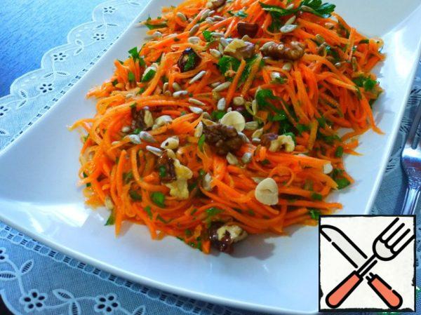 Mix carrots, parsley, nuts and dressing, let stand for about 15 minutes.