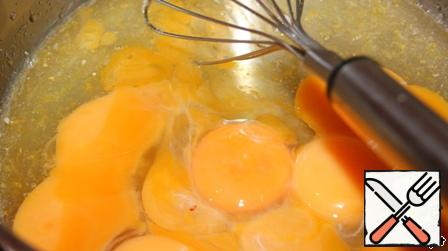 Add the yolks, mix well.
