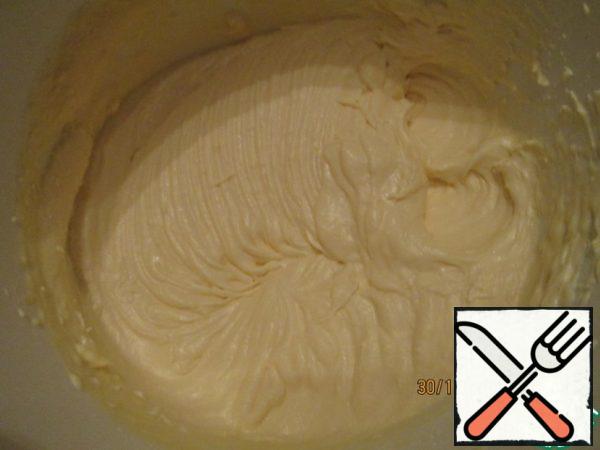 Take a standard cream: whipped oil with condensed milk.