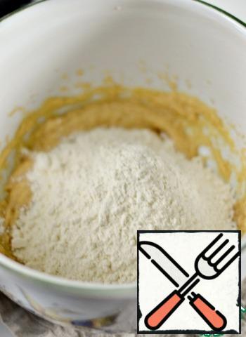 Add flour, mix until not very sticky dough. It may take more flour, depending on its density and size of the egg. You can add more flour if the dough is sticky.