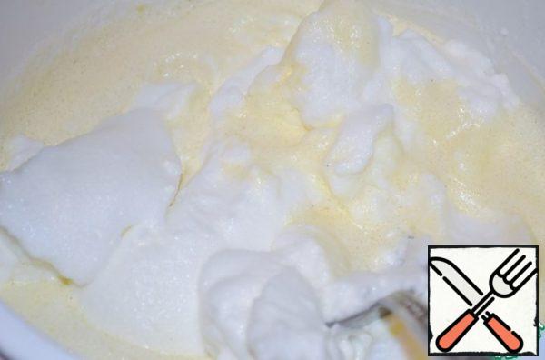 Yolks should be mixed with whipped cream, then with whites.
