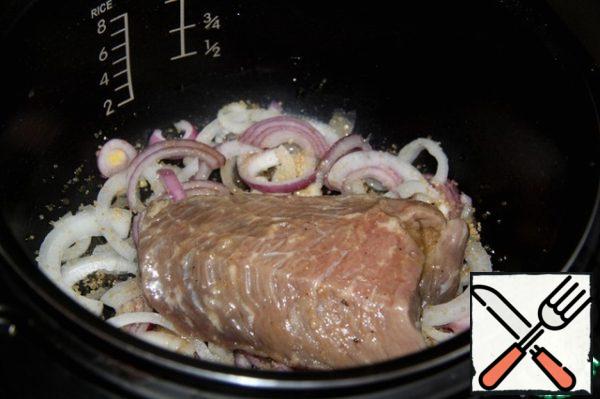 Put on top of our meat and put the bowl in the slow cooker.