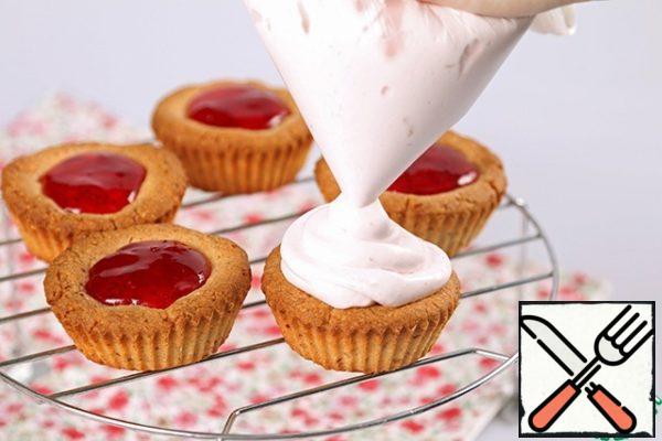 Gently spread cream on top of the filling.
