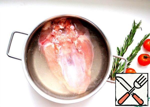 Put the chicken breast in a deep container, then pour saline solution (2 tsp salt per 1 cup of water). The solution should completely cover the chicken breast. Put it in the refrigerator for at least 3 hours.
