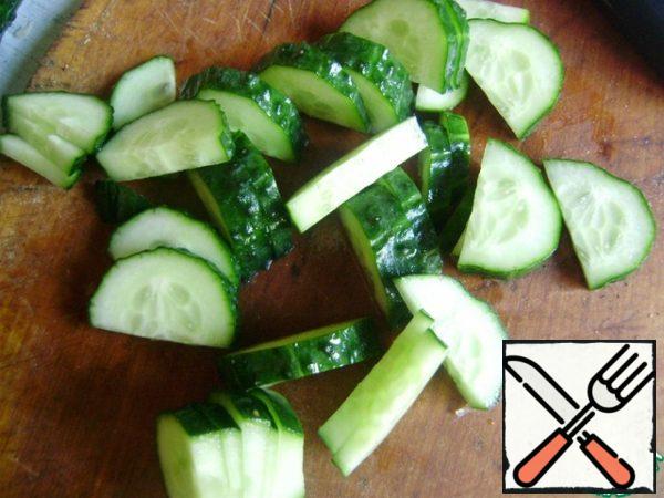 Cucumbers also cut into half rings.