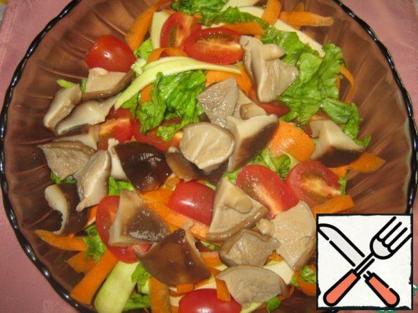 Add chopped pickled mushrooms to the salad.
