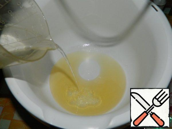 Mix the oil with hot water.