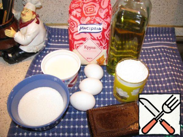 Take the original products: 3 eggs, a glass of sugar, a glass of sour cream, a glass of semolina, a glass of flour, vanilla sugar, baking powder, vegetable oil ( you can use margarine, but I'm the enemy of margarine in baking, so I use only butter or vegetable) and marmalade formation.