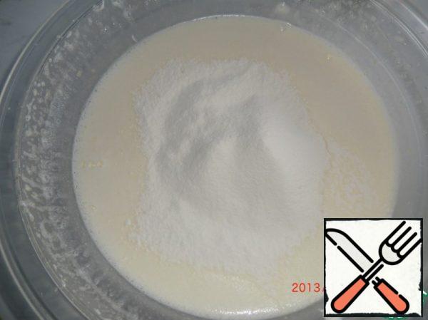 Gradually introduce flour mixed with baking powder.
The dough is mixed with a spoon already, gently.
