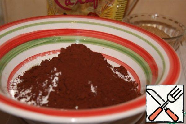 Mix and sift together flour, cocoa, baking powder and 1 g vanilla.