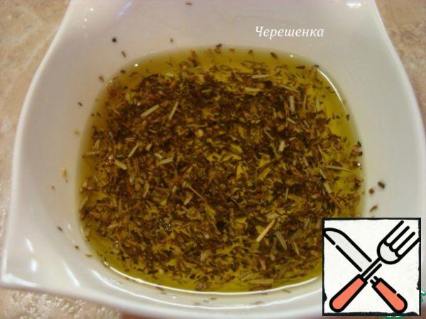 Mix olive oil with herbs. If you are the lucky owner of fresh thyme or rosemary, then, of course, take fresh grass, finely chopped, the aroma will be much stronger and brighter!
