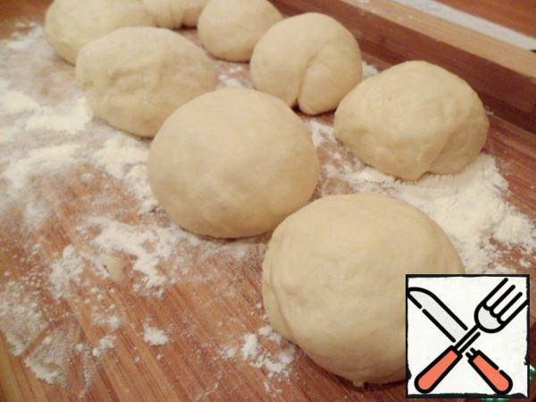 From the second half of the dough forming balls 9.