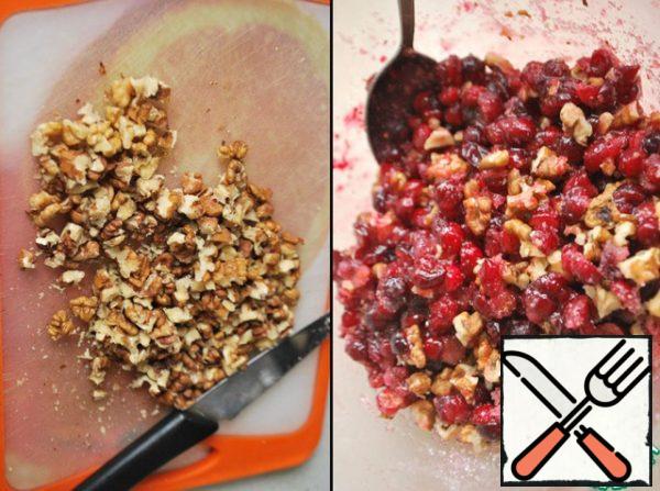 Walnuts to chop into large pieces. Mix with cranberries.