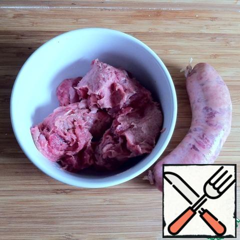 Squeeze the sausage meat out of the shell. You can use any minced meat to your taste. I really like a set of spices in sausages-grill local manufacturer, so I decided to use them.