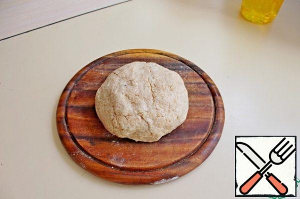 Knead the soft elastic dough. Wrap in film and put in the refrigerator for 20 minutes.