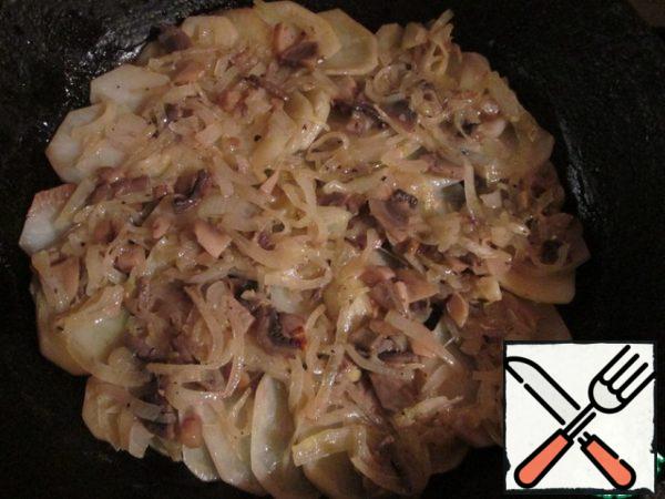 Bake potatoes, onions and mushrooms under the grill until cooked.
