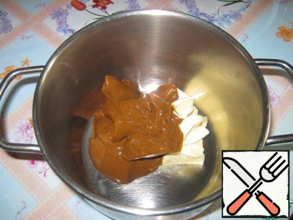 Margarine or butter (room temperature) whisk with boiled condensed milk.