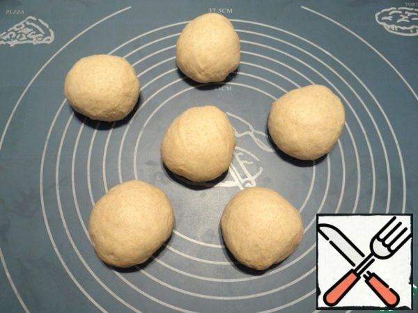 I form balls of dough.